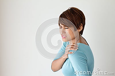 Woman with shoulder pain Stock Photo