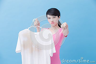 Woman with dirty shirt Stock Photo