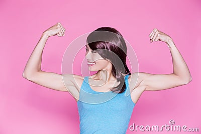 Woman show strong arm Stock Photo