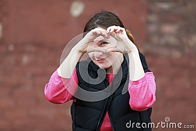 Woman showing heart Stock Photo