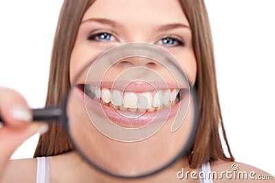 Woman showing her healthy teeth Stock Photo
