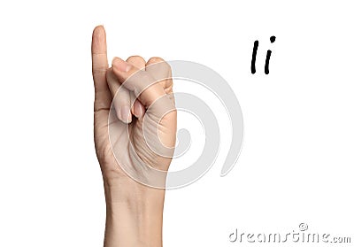 Woman showing letter I on background, closeup. Sign language Stock Photo
