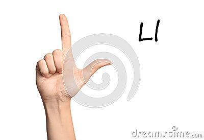 Woman showing letter L on background, closeup. Sign language Stock Photo