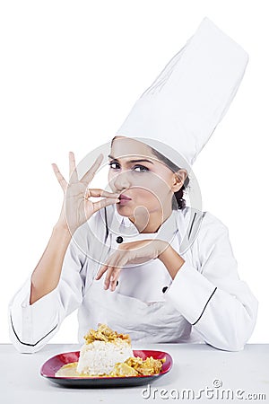 Woman showing perfect gesture with delicious food Stock Photo