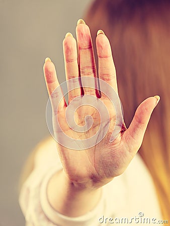 Woman showing stop gesture Stock Photo
