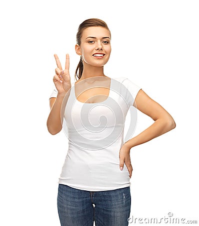 Woman showing victory or peace sign Stock Photo