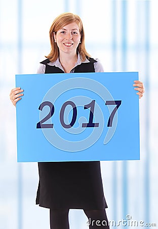Woman showing 2017 Stock Photo