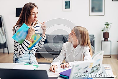 Woman shows how to pronounce the th sound Stock Photo