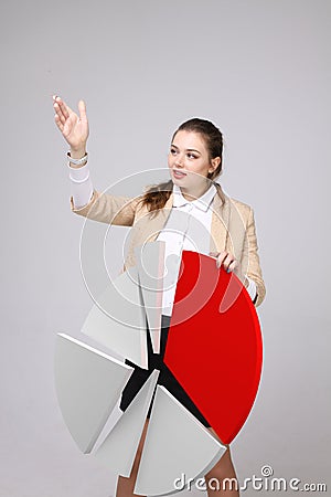 Woman shows a pie chart, circle diagram. Business analytics concept. Stock Photo