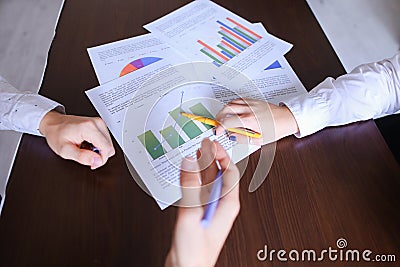 Woman Shows to Man Graph And Documents. Guys Preparing For Proje Stock Photo