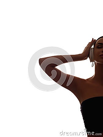 woman silhouette music inspiration in headphones Stock Photo