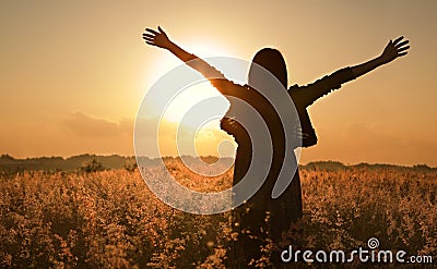 Woman silhouette waiting for summer sun Stock Photo