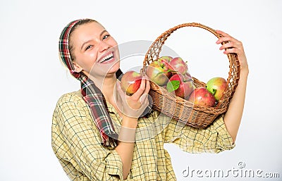 Woman sincere villager carry basket with natural fruits. Lady farmer gardener proud of her harvest. Woman gardener Stock Photo