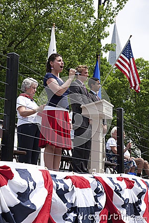 Woman singing on Memorial Day Editorial Stock Photo