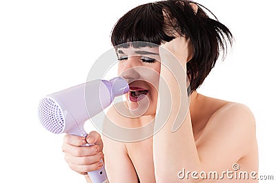 Woman sings in the dryer Stock Photo