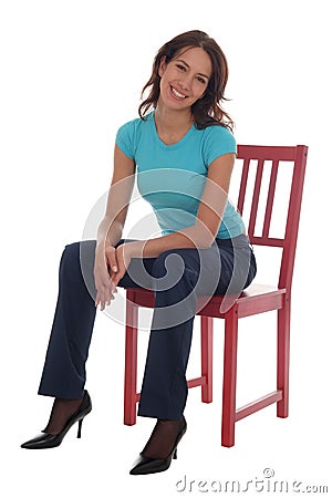 Woman sitting on chair Stock Photo