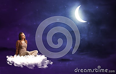 Woman sitting on cloud Stock Photo