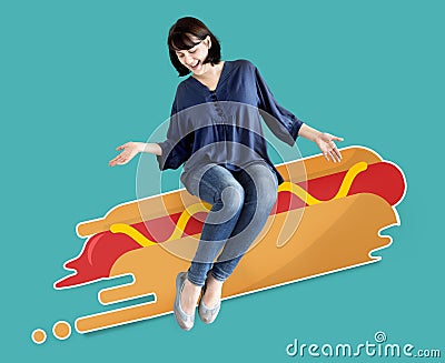 Woman sitting on an illustrated hot dog Stock Photo