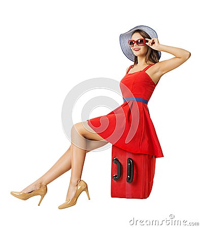 Woman sitting on vacation suitcase. Summer holiday Stock Photo