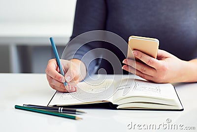 Woman sketching graphic design for new website Stock Photo