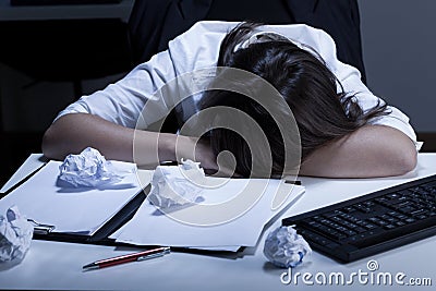 Woman sleeping in the office Stock Photo