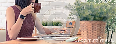 Woman small business owner, business start up conceptual, young entrepreneur check on laptop in the morning Stock Photo