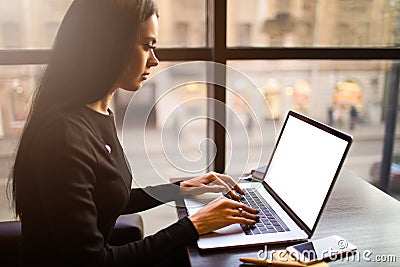 Woman smart university student having online learning via pc laptop computer with empty mock up copy space screen Stock Photo