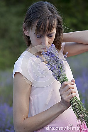 Woman smelling bouquet lavender Stock Photo