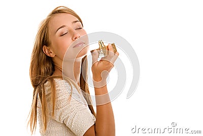 Woman smelling perfume Stock Photo