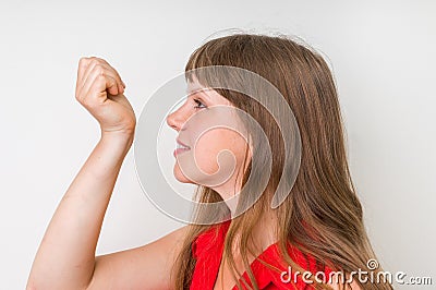 Woman smelling perfume on her wrist Stock Photo