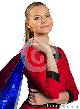 Woman with smile handing bags. Half long picture Stock Photo