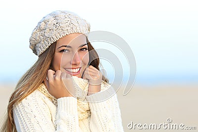 Woman smile with a perfect white teeth in winter Stock Photo