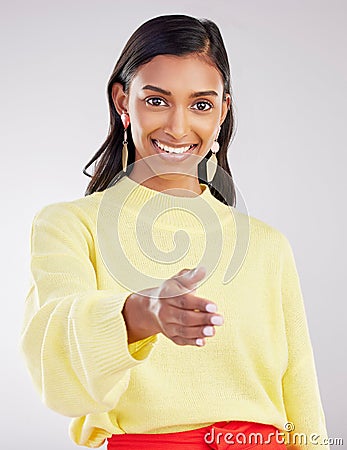Woman, smile in portrait and handshake, agreement and partnership deal with onboarding and recruitment on studio Stock Photo
