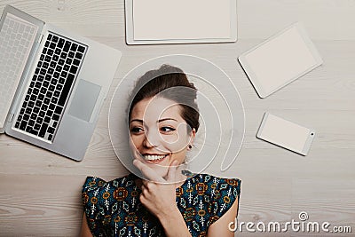Woman smiles, great idea found Stock Photo