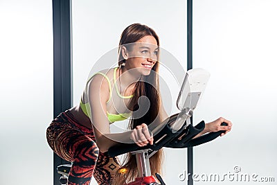 Woman smiling in the bike Stock Photo