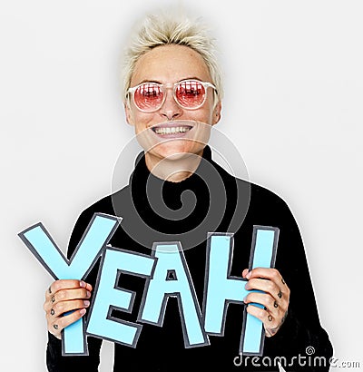 Woman Smiling Happiness Holding Comic Word Yeah Portrait Stock Photo