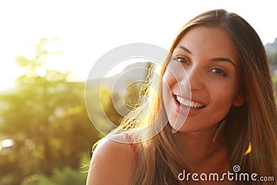 Woman smiling with perfect smile and white teeth thinking and lo Stock Photo