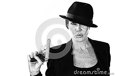 Woman with smoking gun Stock Photo