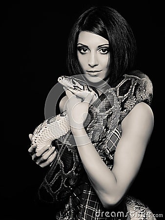 Woman with a snake Stock Photo