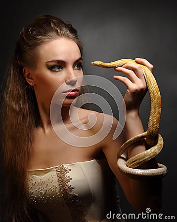 Woman with snake Stock Photo