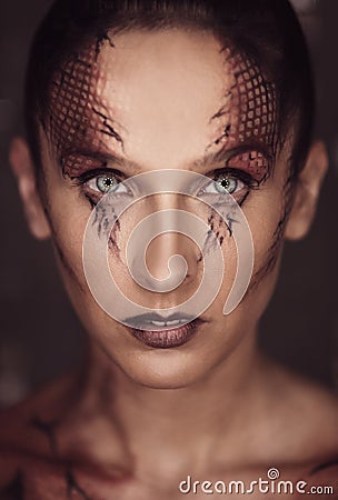 Woman with snake scales Stock Photo