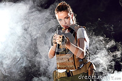 Woman sniper with SVD sniper rifle. Female in Army soldier with machine gun. Stock Photo