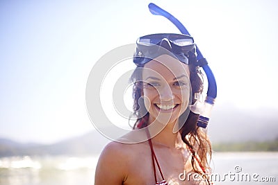 Woman, snorkeling and mask in portrait, beach and adventure for travel, fun and activity. Female person, bikini and Stock Photo