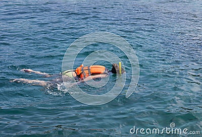 Woman snorkelling in andaman sea at phi phi islands, Thailand Stock Photo