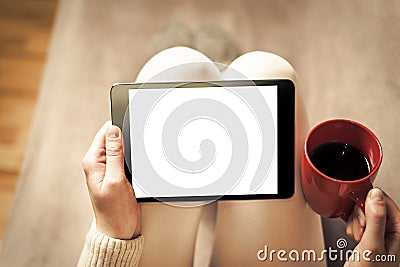 Woman on the sofa with tablet pc Stock Photo