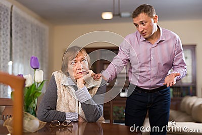 Woman and son offended by each other Stock Photo