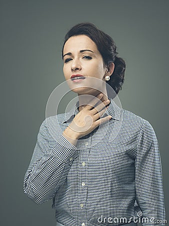 Woman with sore throat Stock Photo