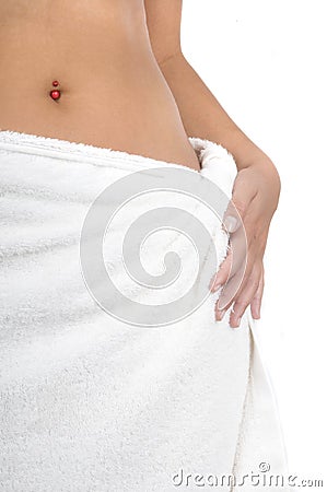 Woman with spa towel around waist Stock Photo