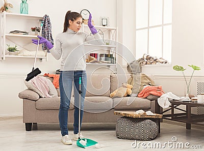 Woman with special equipment cleaning house Stock Photo