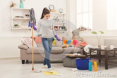 Woman with special equipment cleaning house Stock Photo